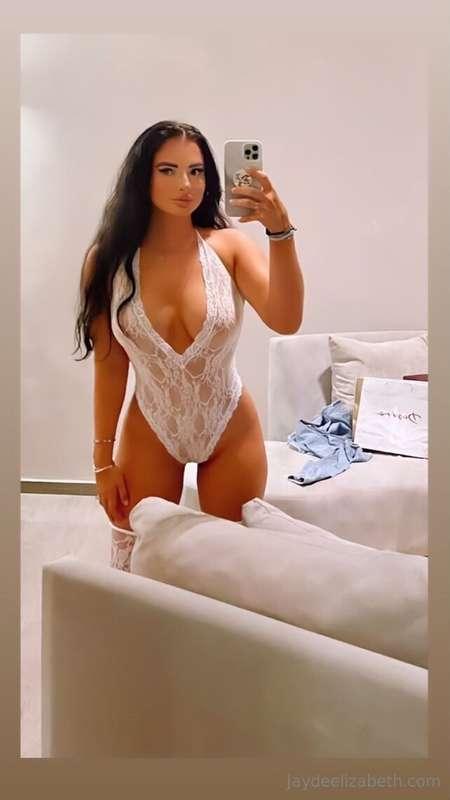 White bodysuit, curve-hugging perfection. What more could yo..