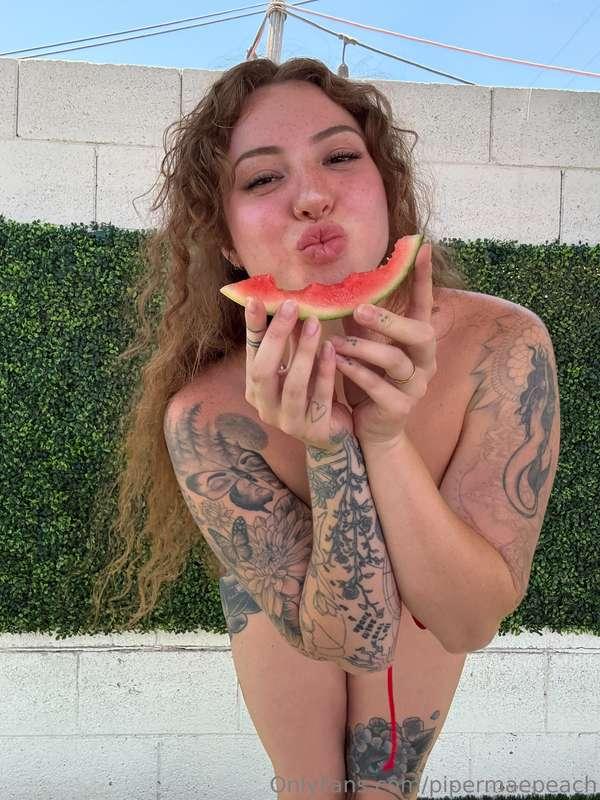 This watermelon isn’t the only thing that’s juicy around her..