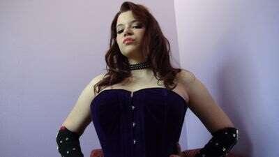 Femdom Meow in a corset
