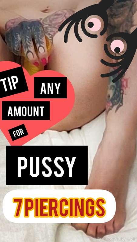 Seven pussy piercings wrapped around a golden Midas cock.

T..