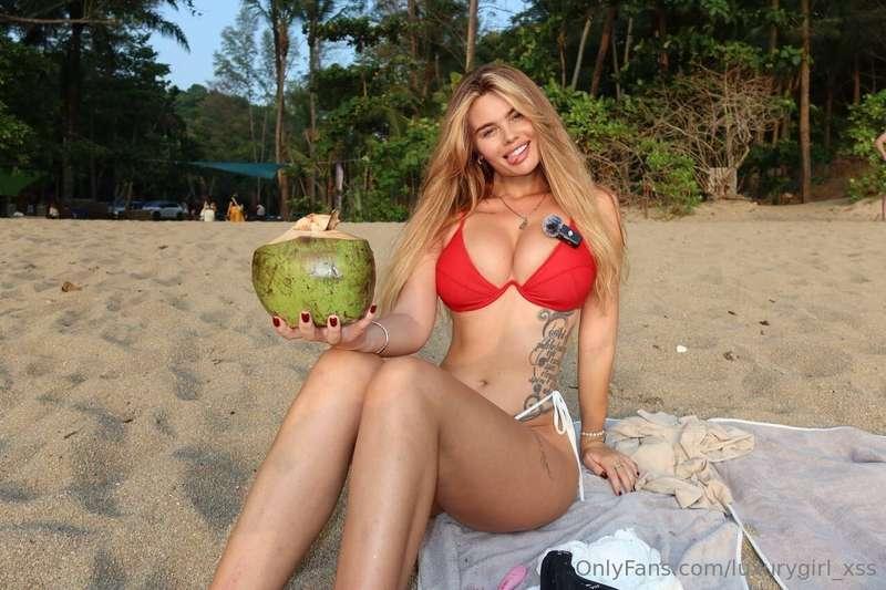 ☀️Sun is warm, ocean’s whispering, and I’m holding a coconut..