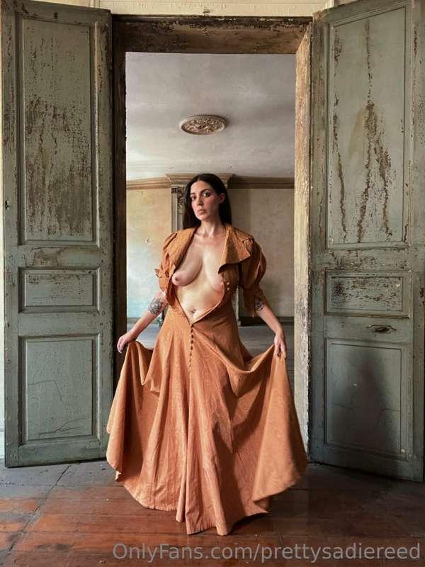 An antique coral day dress (ca 1920-1930).