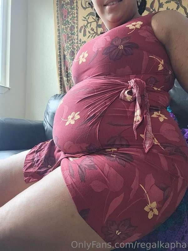 I can't stop admiring how pregnant I look with my huge belly..