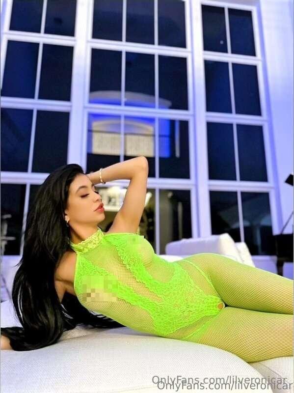 Neon lace hugs me just right, glowing like I was made for th..