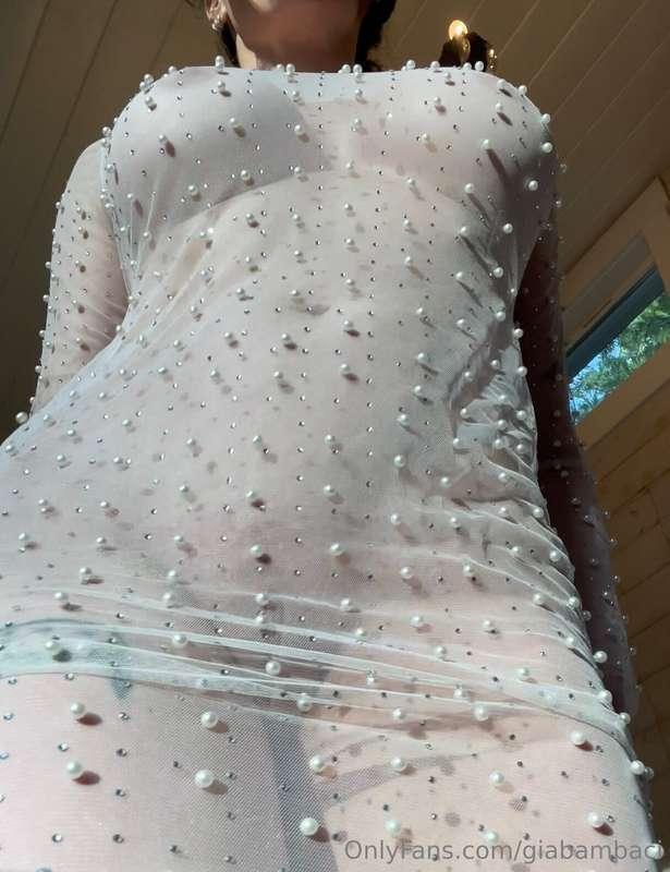 The pearls and rhinestones on this dress feel like water dro..