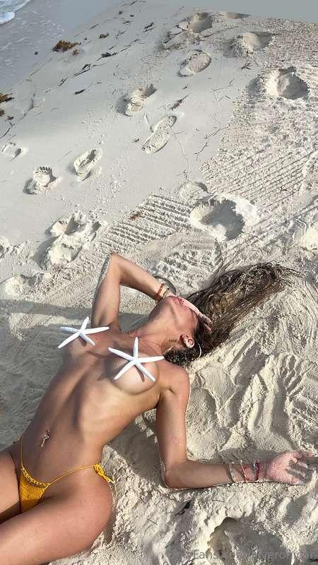Laid out like a starfish, covered in sand, but I’d rather be..