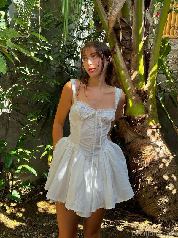 What do you think of my dress? I look like I ran away from a..