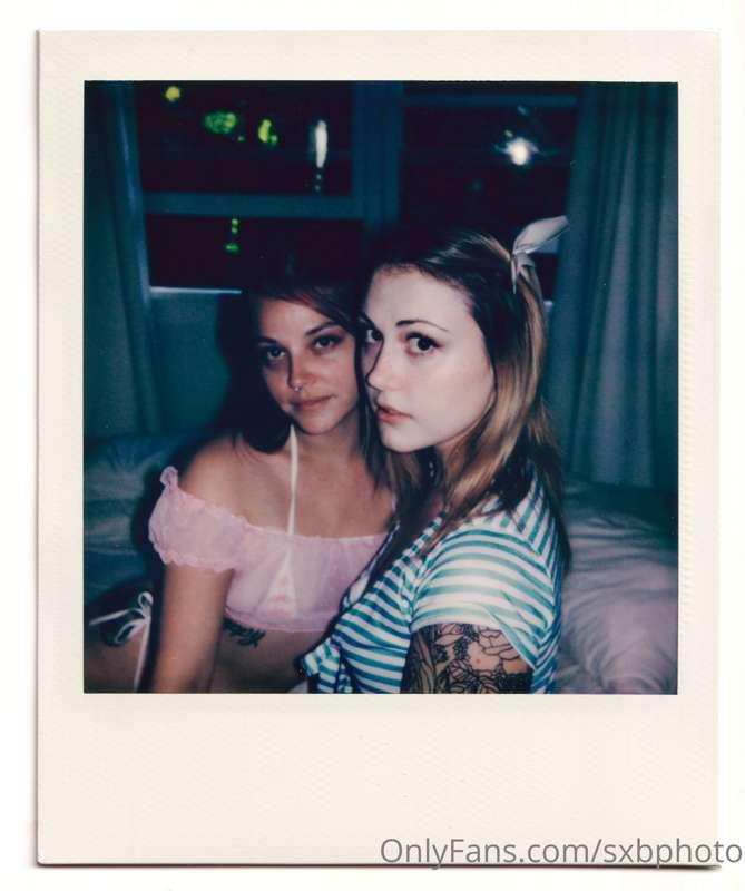 Polaroids of @aziebugx and @babyfilth, baby girls in bed tog..