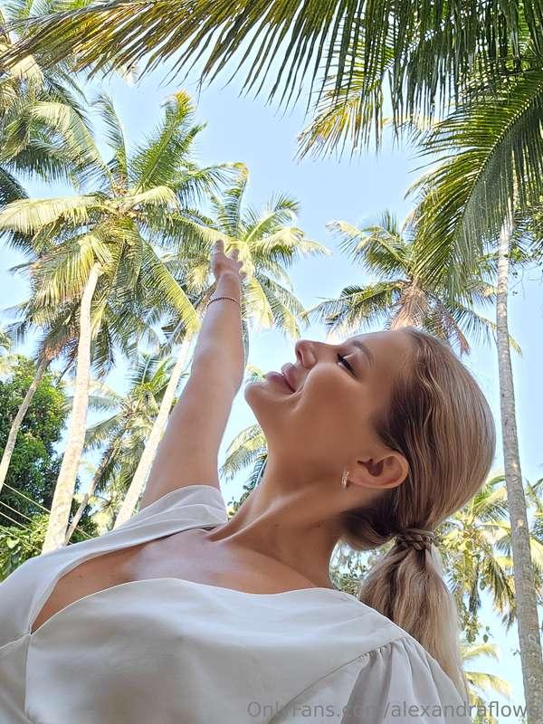 Reaching my hand towards the sun, as if trying to catch its ..