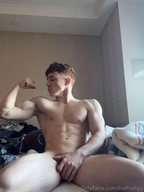 No clothes needed when you've got muscles like these. 😈