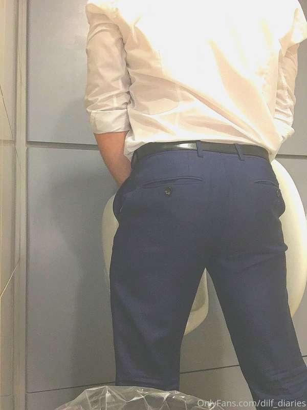 Navy suit pants urinal showoff