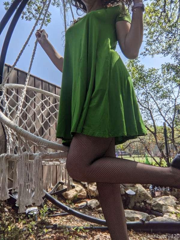 Little green dress in the garden... Do you like what's under..