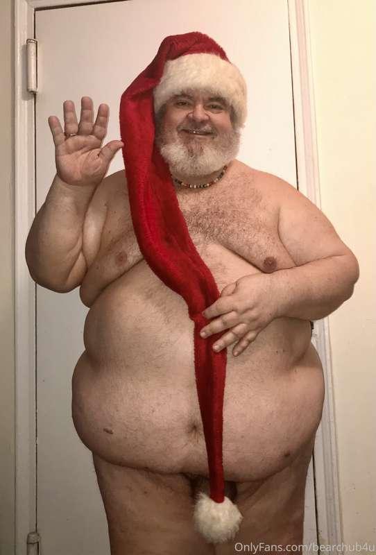Santa is finished with the holidays and heading to a nude be..