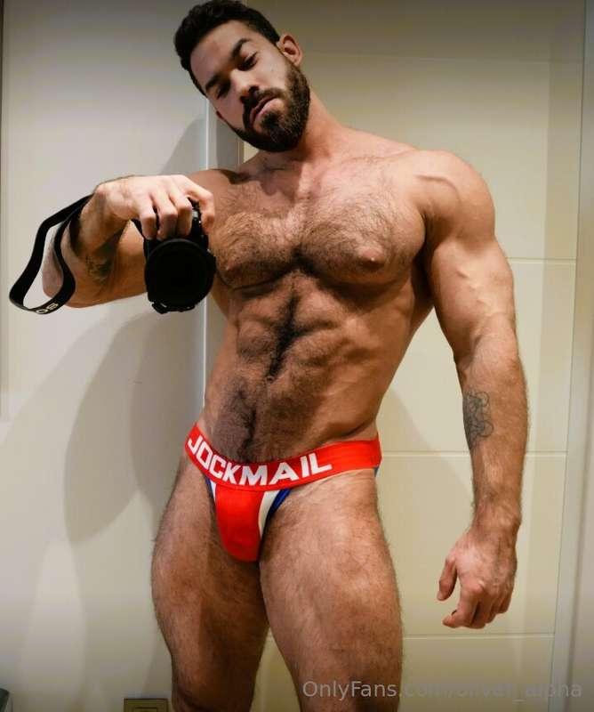 Mirror shot with the digital cam half naked, briefs stretche..