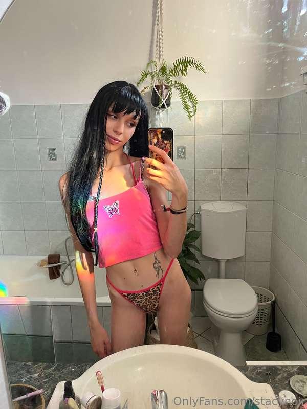 Mirror selfie time! I'm wearing a cute pink crop top paired ..