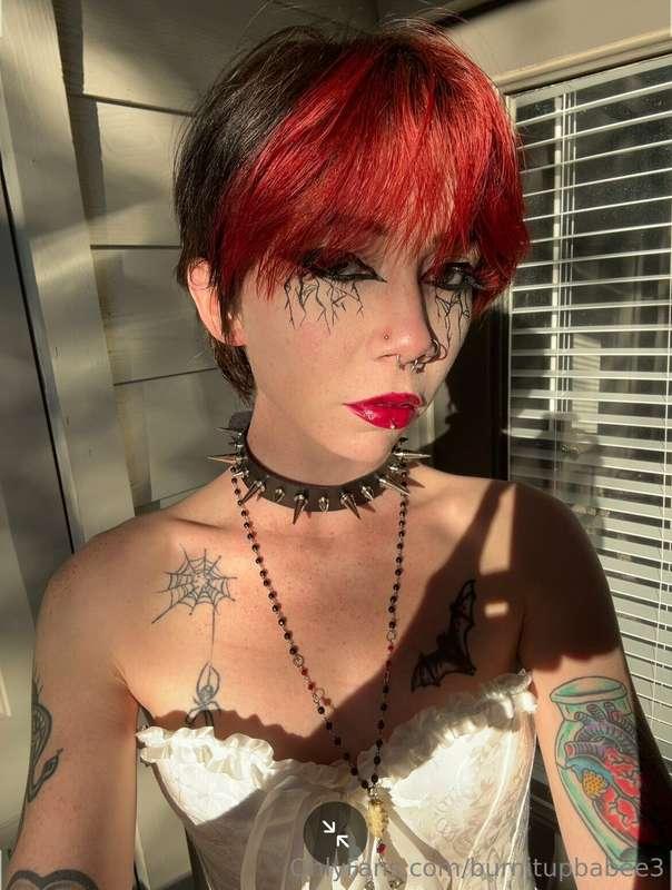the only thing this makeup look is missing is a faceful of c..