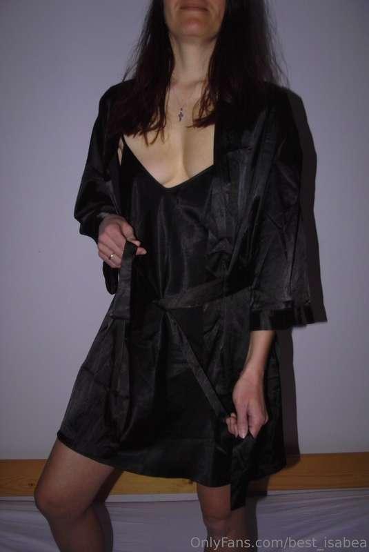 I bought this tantalizing black negligee that's pure allure...