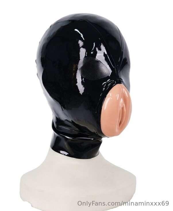 Help me buy a couple of new, very kinky masks. The one in th..