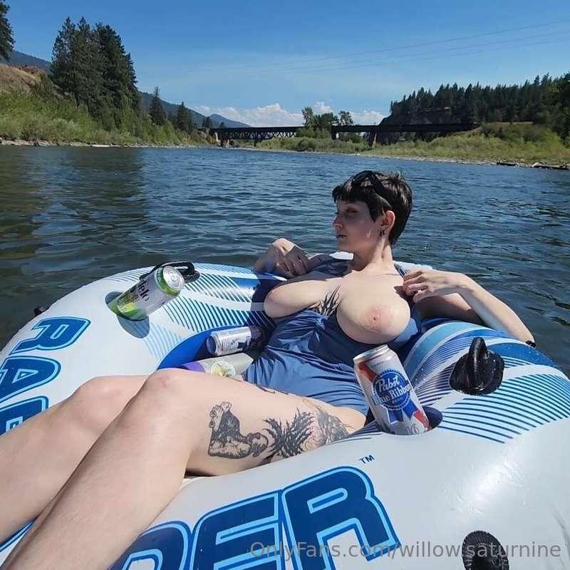 Floating the river with my boobs out :3 