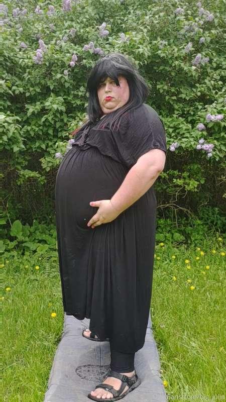 My belly is so big i almost look pregnant in this dress. Who..