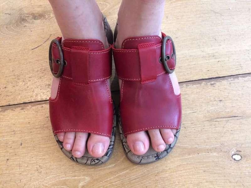 Sandals without socks literally acquire an outline of the to..