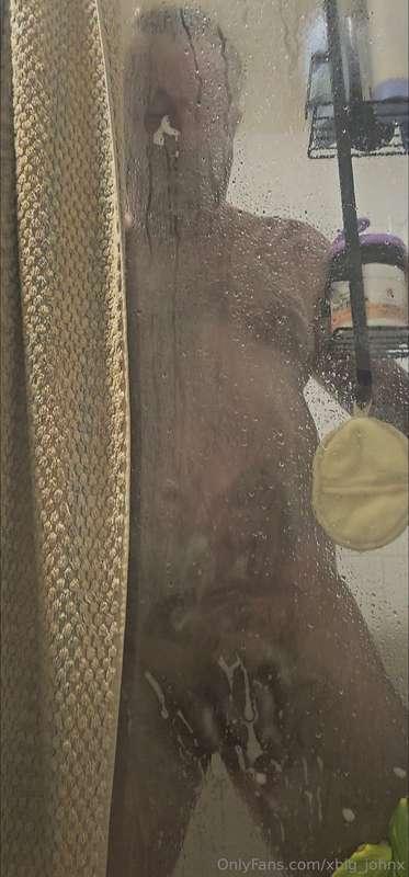 All soapy behind the glass in the shower, shaking my trunk a..