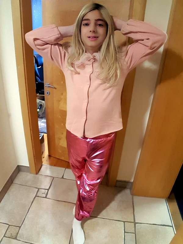 Such a sweet gurly top and shiny trousers ... luv it