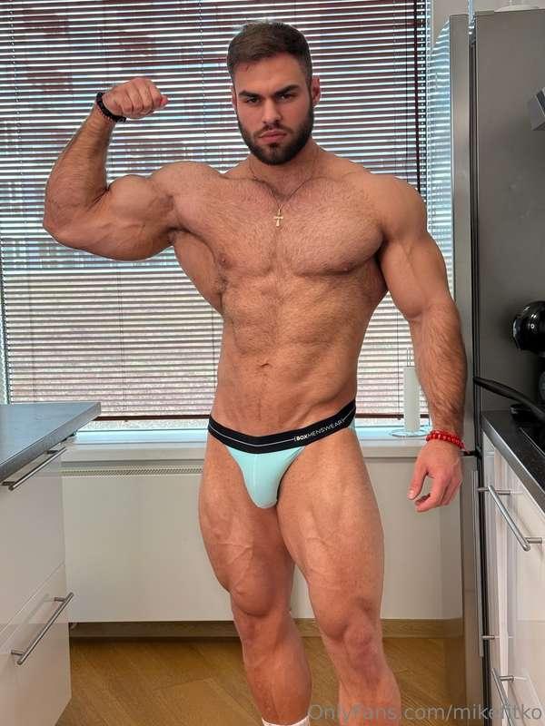 Flexed up, shirt off, cock long and hard in my brief… you go..