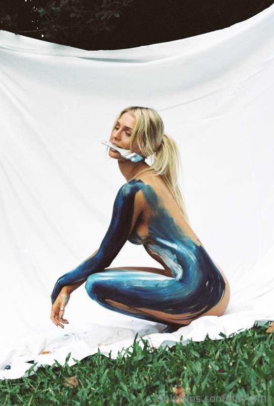 Who needs clothes when you can wear art instead? 🎨😉